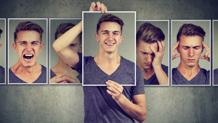 A man pictured showing a range of different emotions, signifying a mood disorder