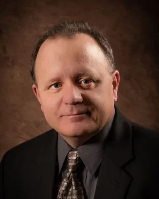 Dr. Chris Miller
