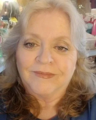 Laura J Adams