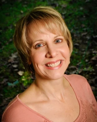 Laura K Tauzin