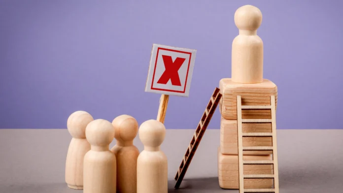 Wooden figured rejecting another wooden figure. Learn more about rejection sensitivity dysphoria here