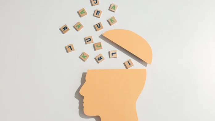 A depiction of a human head with letters flowing out of it. Learn about the different types of therapists here