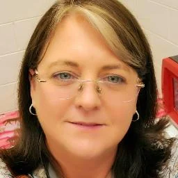 Dr. Tina Caro
