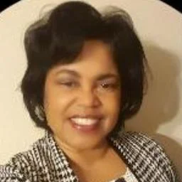 Dr. Norma Charles